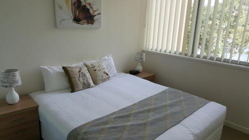 Katil atau katil-katil dalam bilik di Itara Apartments