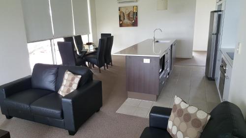 Dapur atau dapur kecil di Itara Apartments