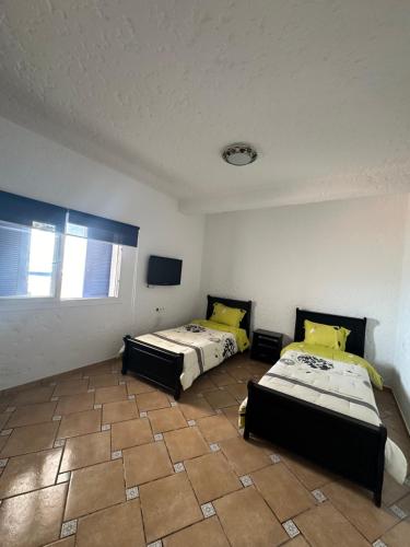 Postel nebo postele na pokoji v ubytování Chalet cabo negro