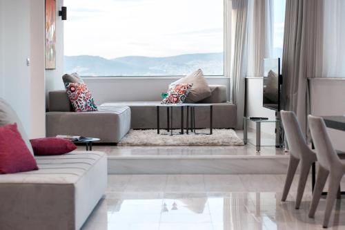 Zona de estar de Athenaeum Grand Hotel