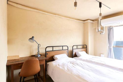 Postel nebo postele na pokoji v ubytování DELTA HOSTEL