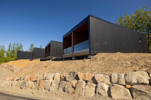 a house on top of a pile of dirt at North Mountain View Suites in Akureyri