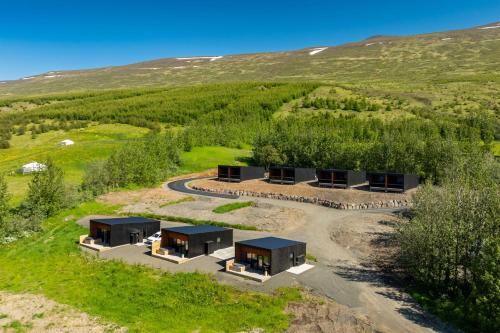 an aerial view of aolithicolithicolithic house on a hill at North Mountain View Suites in Akureyri