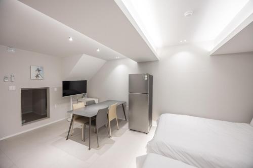 Μια τηλεόραση ή/και κέντρο ψυχαγωγίας στο Guesthouse Dear Moon