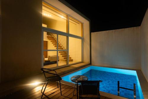 Bazén v ubytování Secret Villas by Relapool nebo v jeho okolí