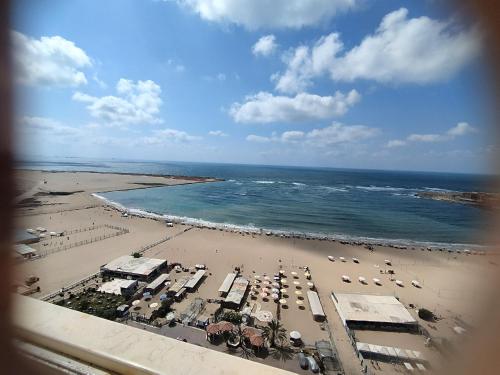 an aerial view of a beach and the ocean at Alex Panoramic seaview in Alexandria