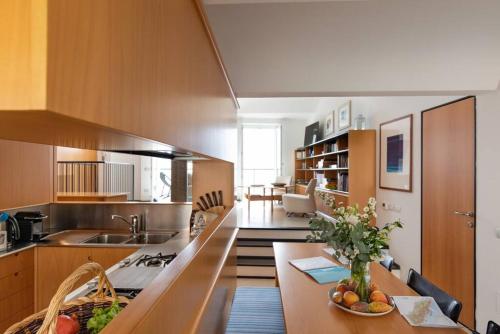 A kitchen or kitchenette at Carattino 12 Idyllic Seafront Retreat