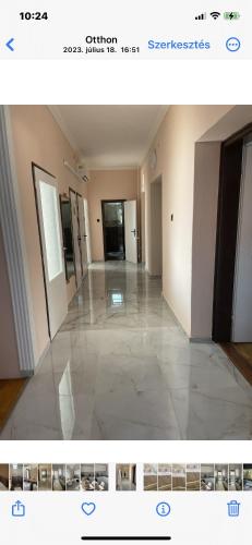 a picture of a hallway in a building at Aranyapartman in Kisbajcs