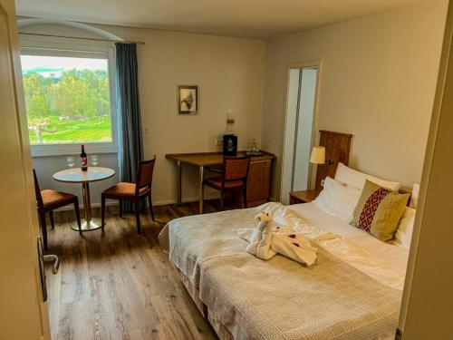 Postel nebo postele na pokoji v ubytování Gästehaus Inselhof