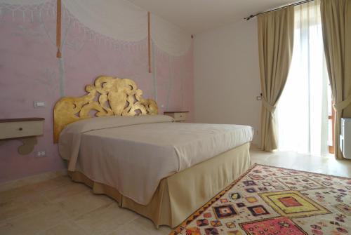 Letto o letti in una camera di Molino Della Lodola