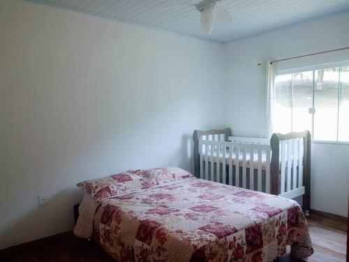 Postel nebo postele na pokoji v ubytování Fazenda Cantinho - chalé 2 qts reformado