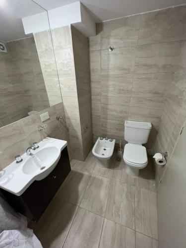 a bathroom with a sink and a toilet at Cielo Norteño in San Salvador de Jujuy