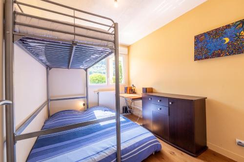 En eller flere senge i et værelse på T3 Au vert à 5 Min d'Annecy centre