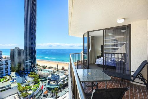 a balcony with a view of the beach and the ocean at Paradise Centre Apartments managed by Gchs in Gold Coast