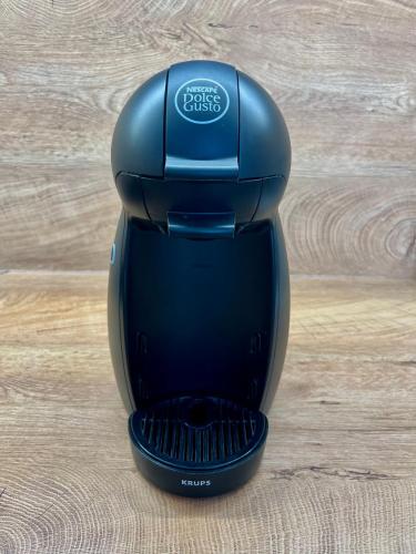 a black hair dryer sitting on a wooden table at U Srubu in Moravany