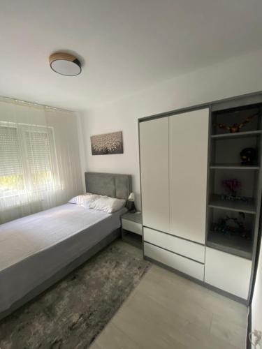 Ένα ή περισσότερα κρεβάτια σε δωμάτιο στο Ostro Two Bedrooms