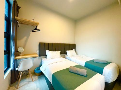 Ένα ή περισσότερα κρεβάτια σε δωμάτιο στο Sunset Seaview Vacation Condos @ Jesselton Quay