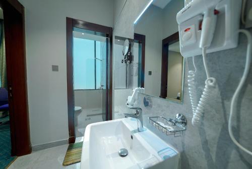Ένα μπάνιο στο Celine Home Serviced Apartment - Tuwaiq