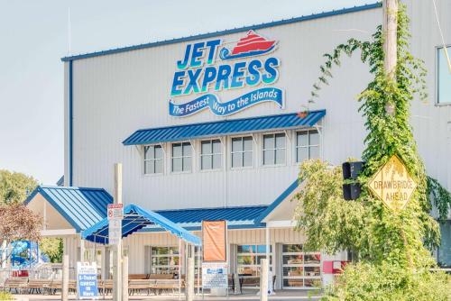 a building with a sign that reads lift express at Super 8 by Wyndham Port Clinton in Port Clinton
