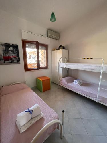 Postel nebo postele na pokoji v ubytování House Turi