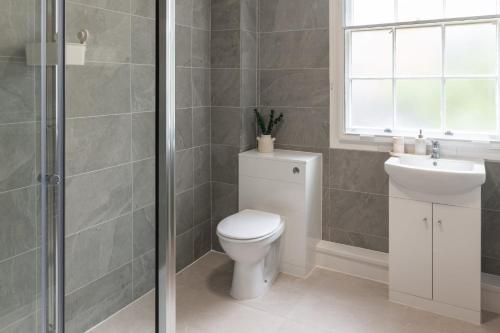 a bathroom with a toilet and a sink and a shower at Host & Stay - The Quarter in Liverpool