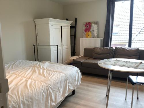 Poppy Home Gent Homestayにあるベッド