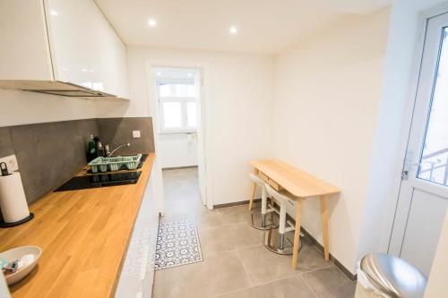 Una cocina o cocineta en Smart Appart - Gare Du Midi