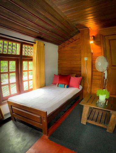 Postel nebo postele na pokoji v ubytování Cottage Home Belihuloya