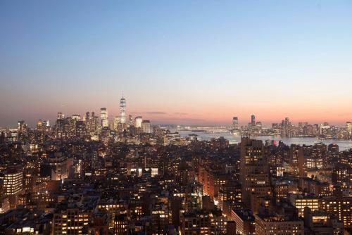 an aerial view of a city at night at Hyatt Place New York Chelsea in New York