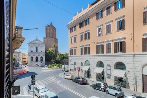 a view of a street in a city with cars parked at 163 BOUTIQUE HOTEL in Rome