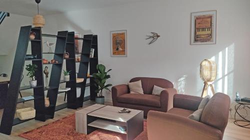 Posezení v ubytování Duplex lumineux et calme en centre-ville