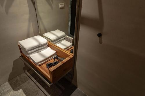 a group of towels sitting in a room at 全村的希望Hope of village in Dongshan