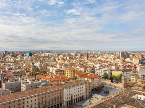 an aerial view of a city with buildings at Apartamentos Zaragoza Gran Vía 3000 in Zaragoza
