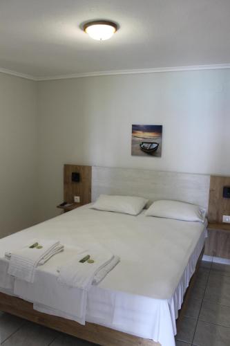 Postel nebo postele na pokoji v ubytování Villa Maria mola