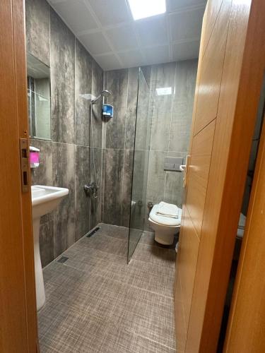 Un baño de Lara Olympos Pansiyon