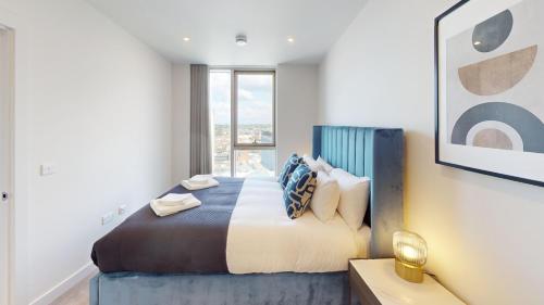 a bedroom with a large bed and a window at Charles Hope Liverpool in Liverpool