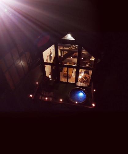 an overhead view of a stage with lights in the dark at Ski & Spa Bungalows in Kopaonik