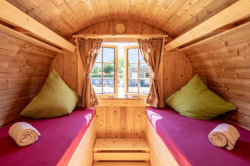 Postel nebo postele na pokoji v ubytování Camping Lazy Rancho - Eiger - Mönch - Jungfrau - Interlaken