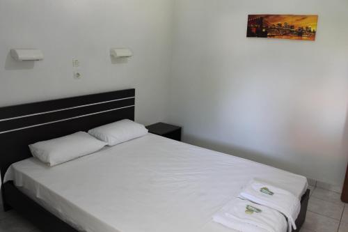 Postel nebo postele na pokoji v ubytování Villa Maria mola