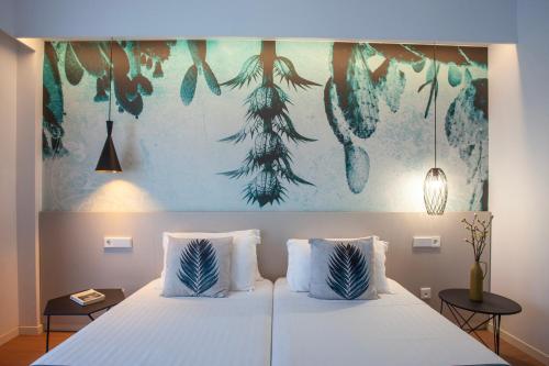 Postel nebo postele na pokoji v ubytování Hotel Torá