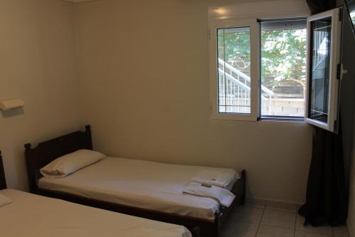 Postel nebo postele na pokoji v ubytování Villa Maria mola
