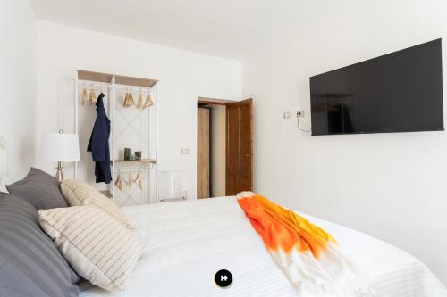 Ένα ή περισσότερα κρεβάτια σε δωμάτιο στο Hotels Too - Home Kristoforo