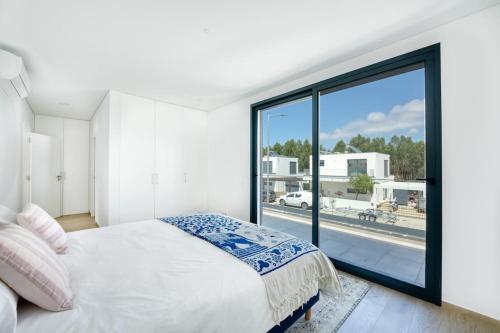 Postel nebo postele na pokoji v ubytování Villa Paradise Bay