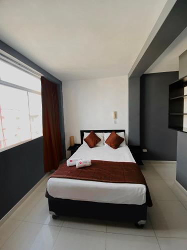 Postel nebo postele na pokoji v ubytování ESCALA BUSINESS HOTEL