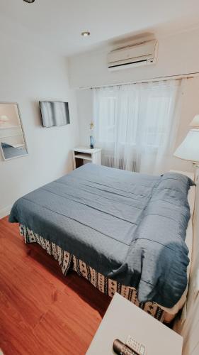 Postel nebo postele na pokoji v ubytování Hotel Punta del Este