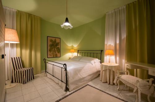 Postel nebo postele na pokoji v ubytování B&B Maison Biagetti