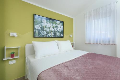 Posteľ alebo postele v izbe v ubytovaní Pinia Apartment Split