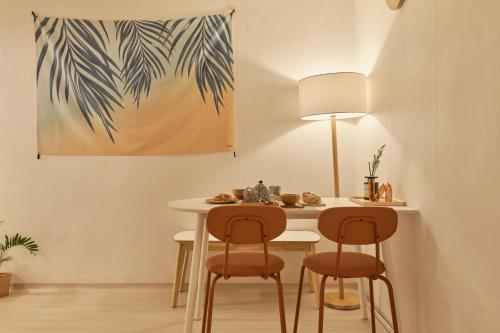 a dining room with a table and two chairs at Zen House,Jamsil Seoul in Seoul