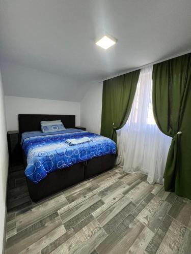 En eller flere senge i et værelse på Cozy and homely-Casa del Sole