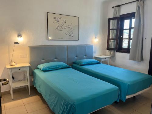 A bed or beds in a room at Beautiful Apartment Altamar